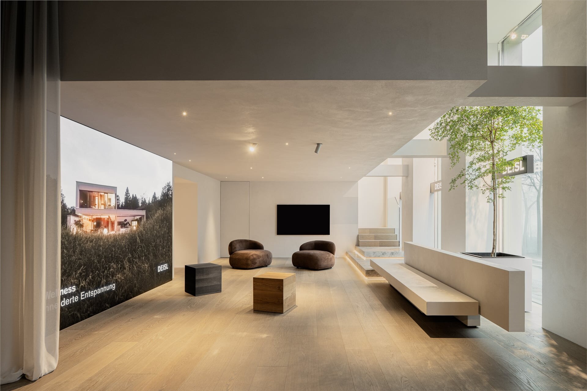 Moderner Concept Showroom mit raumhoher LED-Wall von Deisl Sauna & Wellness am Schubertring in Wien.